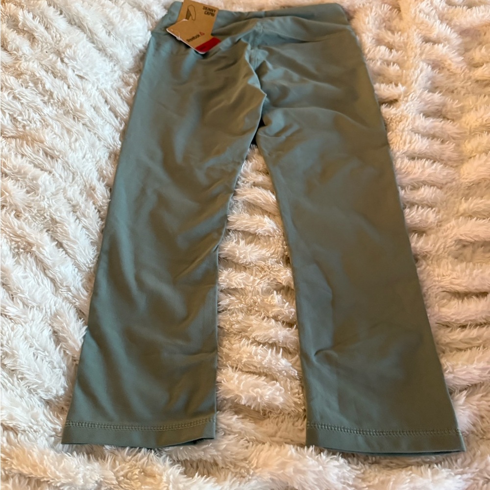 Reebok Women's Capris - Set of 4 1-Mint, 1-Silver, 1-Black and 1 black short. - Picture 4 of 14